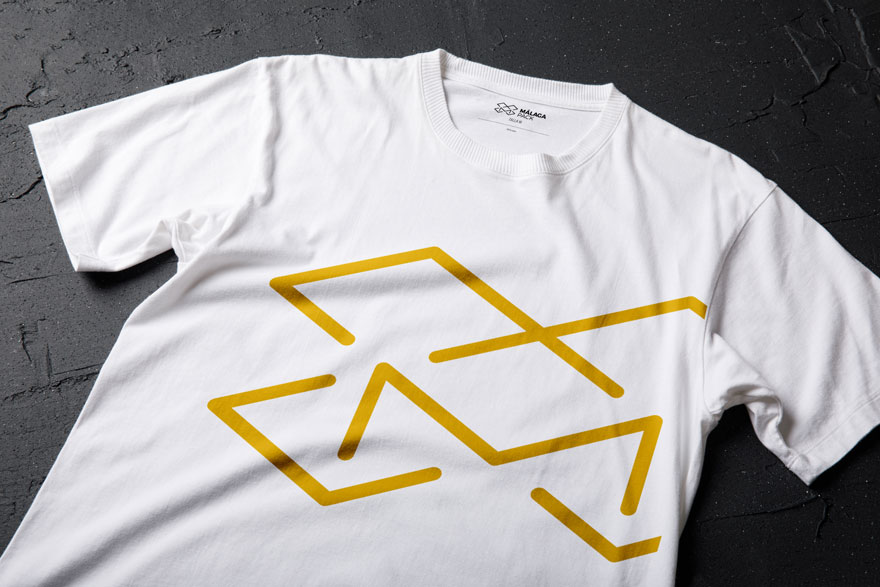 Diseño corporativo de camiseta de Málaga Pack