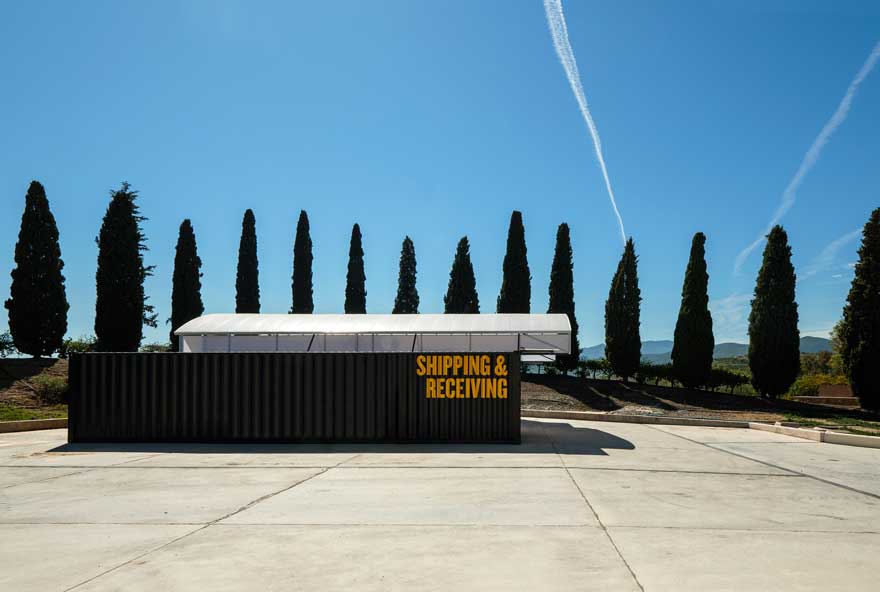 Building facade with shipping containers at Caterpillar